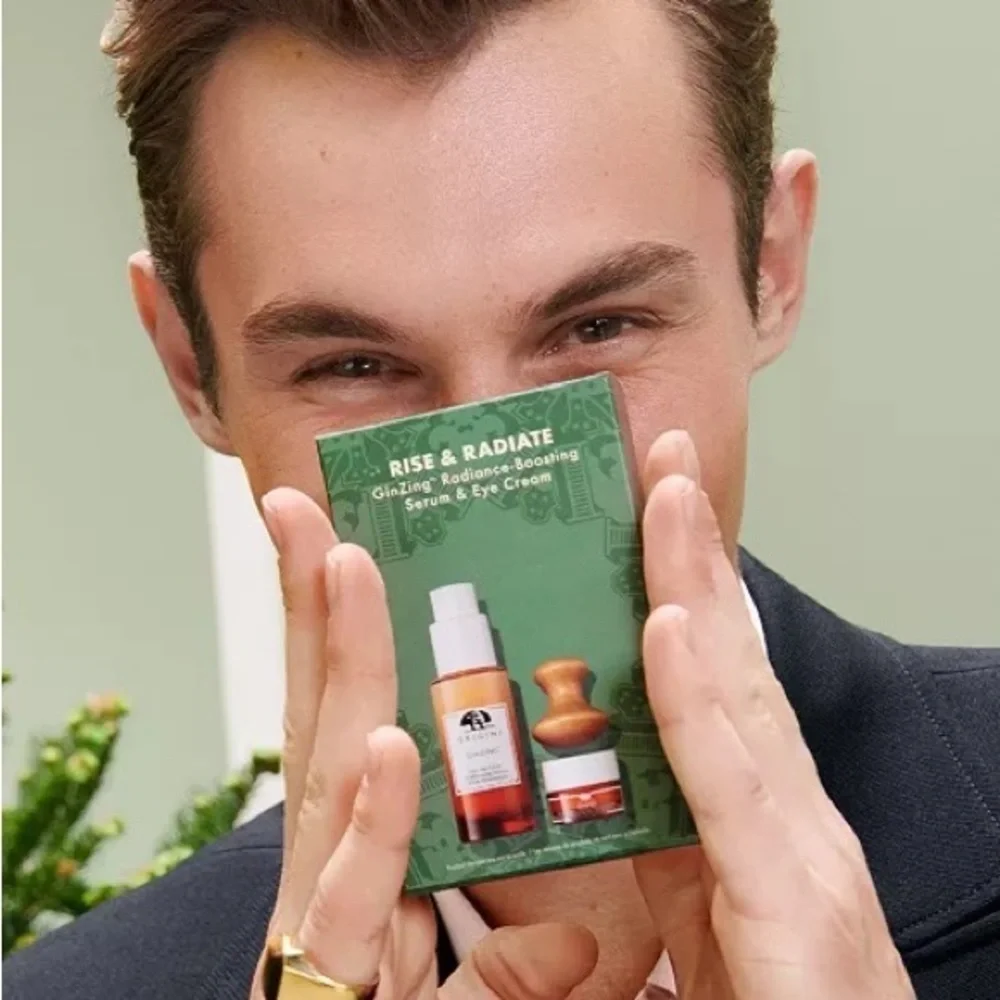 Origins radiance boosting serum , eye cream set and eye massage tool